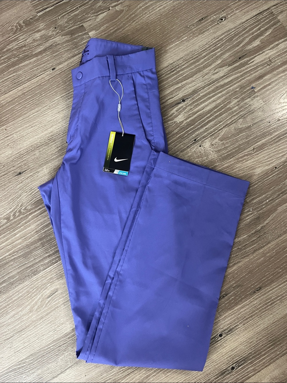 NWT Nike golf pants/28